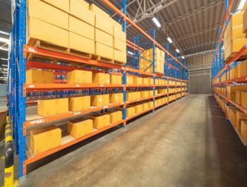 Interior of large warehouse retail store industry. Rack of furniture and home accessories stock storage. Interior of cargo in ecommerce and logistic concept. Depot